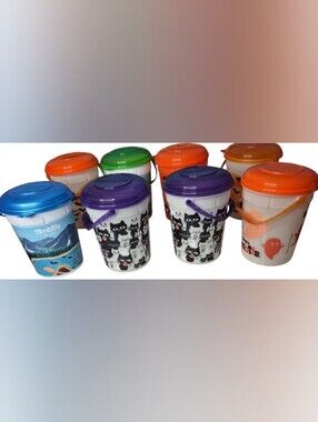 Tim Hortons Halloween buckets with black cat graphics and 'Sew Myths' text